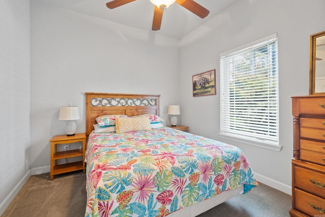 carpeted bedroom with a ceiling fan and baseboards