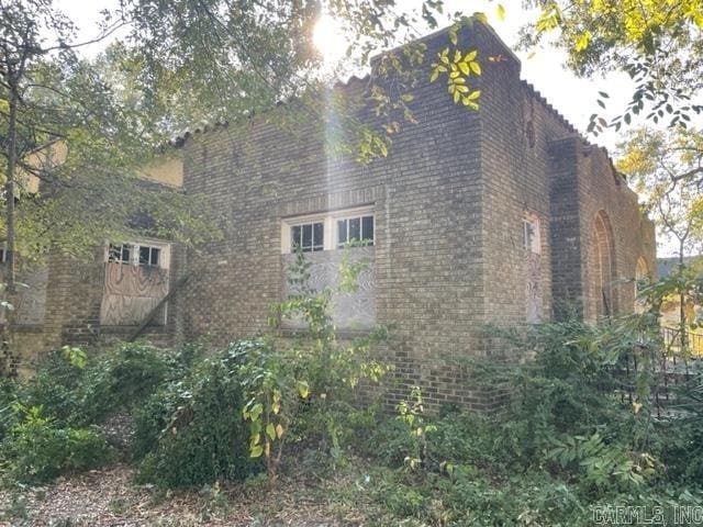 view of side of home with a garage