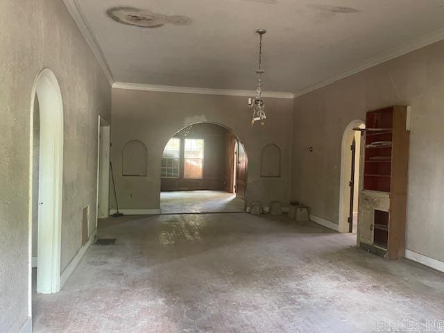 empty room with concrete floors and ornamental molding