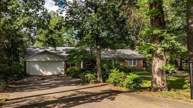 ranch-style home with a garage