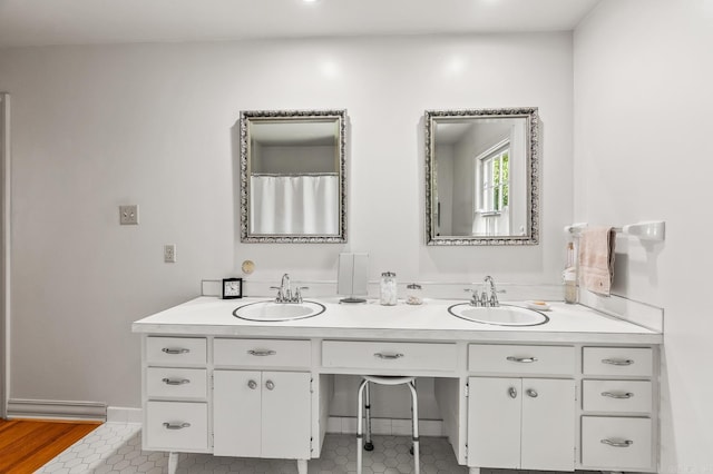 bathroom featuring vanity and tile patterned flooring