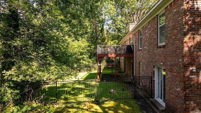 view of yard featuring a wooden deck