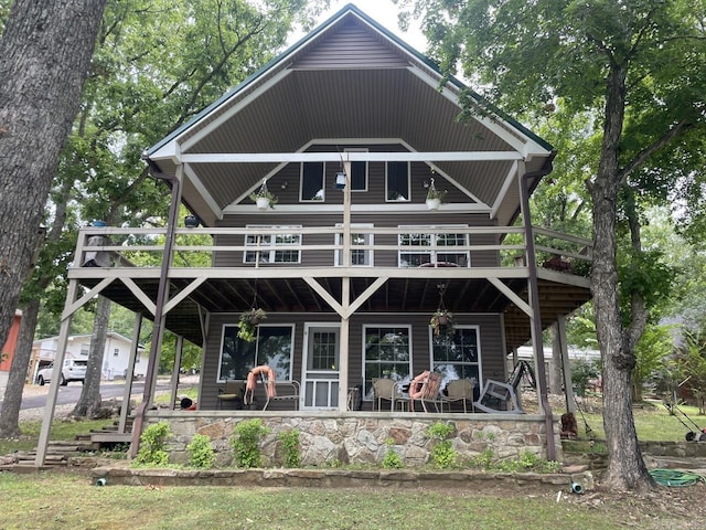 509A Woodland Hills Rd, Hardy, AR 72542 - rear view of house featuring a patio area and a deck
