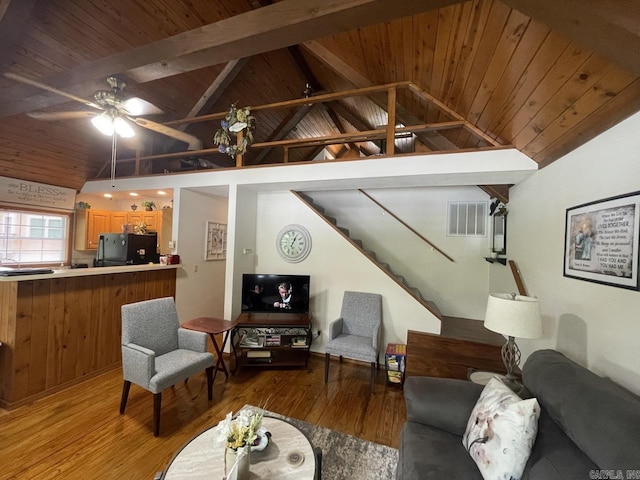 509A Woodland Hills Rd, Hardy, AR 72542 - living room with light wood-style floors, ceiling fan, visible vents, stairway, and wood ceiling