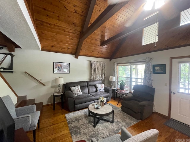 living room featuring beam ceiling, dark hardwood / wood-style floors, ceiling fan, and wooden ceiling