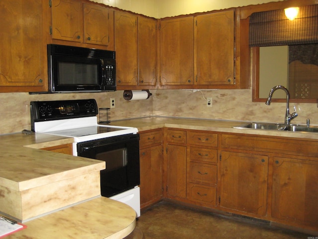 901 Hastey Ave, Mena, AR 71953 - kitchen featuring black microwave, light countertops, decorative backsplash, electric stove, and a sink