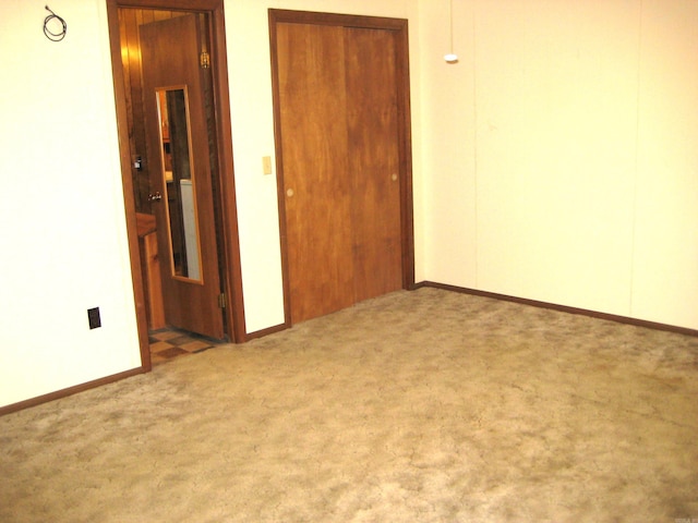 901 Hastey Ave, Mena, AR 71953 - unfurnished room featuring carpet flooring and baseboards