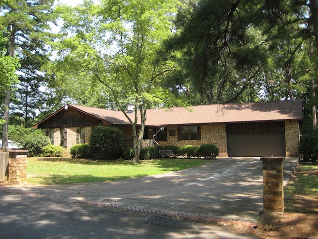 ranch-style house featuring a garage