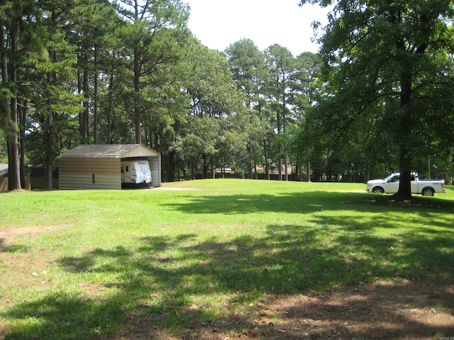901 Hastey Ave, Mena, AR 71953 - view of yard featuring an outbuilding
