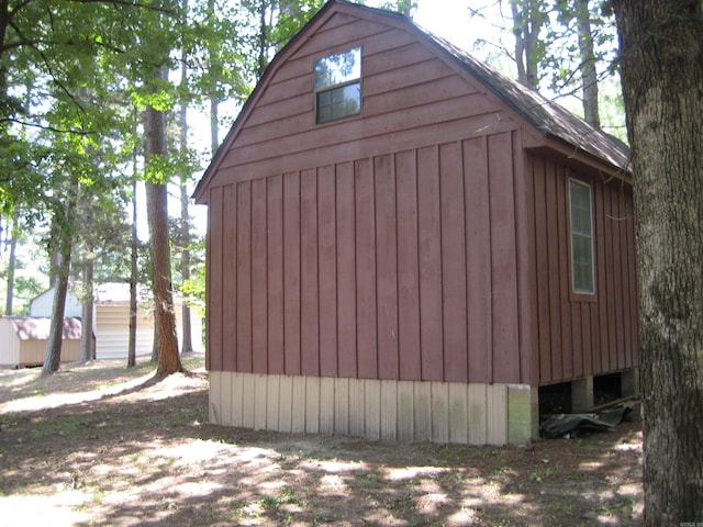 901 Hastey Ave, Mena, AR 71953 - view of side of property with an outbuilding