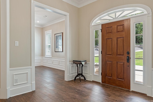 entryway featuring crown molding and dark hardwood / wood-style flooring