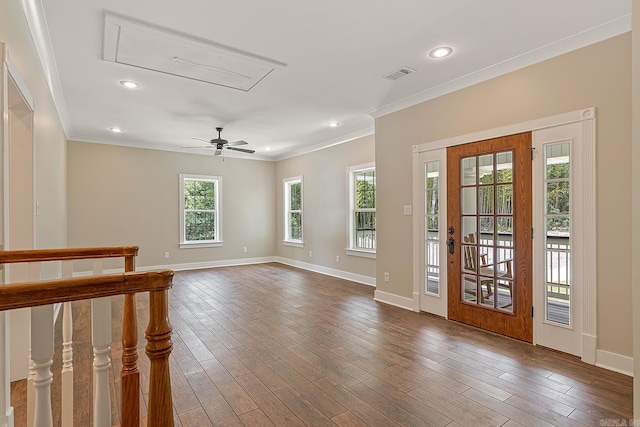 unfurnished room featuring ornamental molding, ceiling fan, and hardwood / wood-style floors