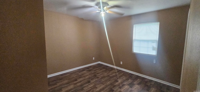 spare room with ceiling fan and hardwood / wood-style flooring