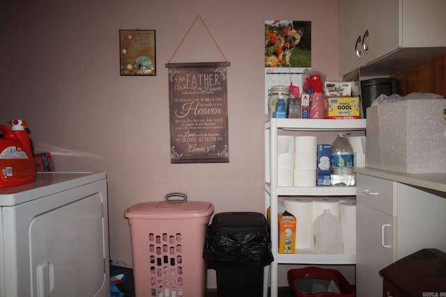 laundry room with washer / clothes dryer and cabinet space