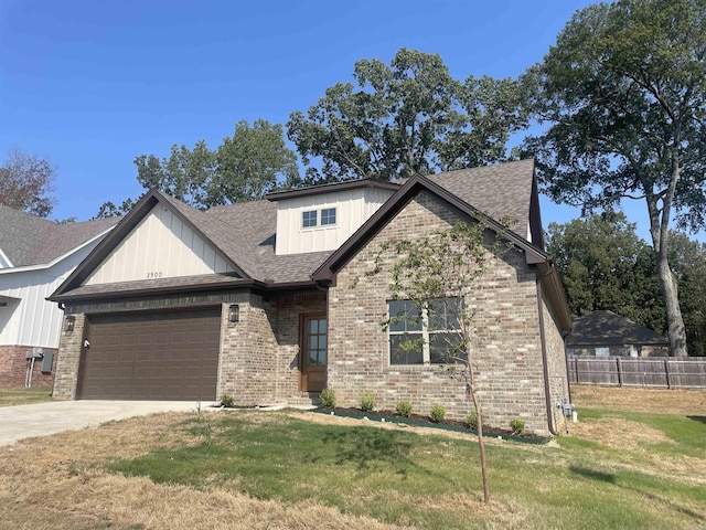 craftsman-style house with a garage and a front yard