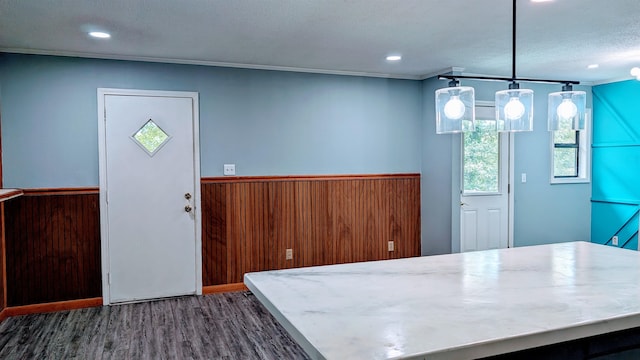 interior space with dark hardwood / wood-style floors and a textured ceiling