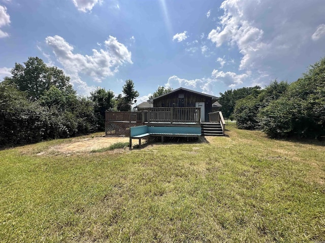 view of yard with a deck