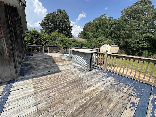 deck featuring a storage shed