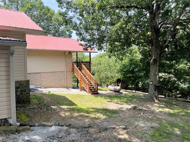 view of yard featuring a wooden deck