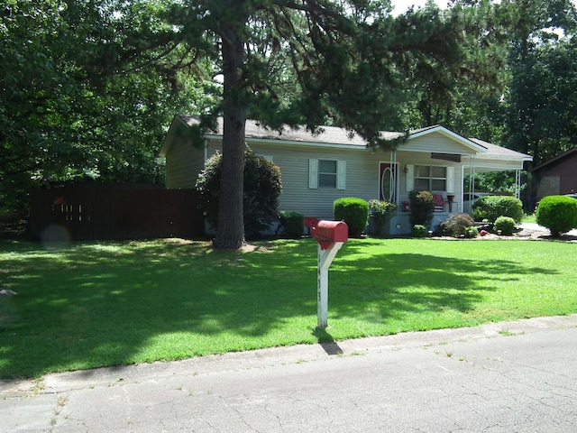 ranch-style house with a front yard