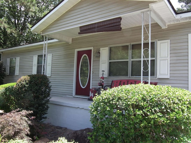 property entrance with a porch