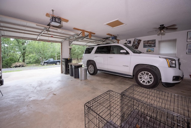 garage featuring a garage door opener