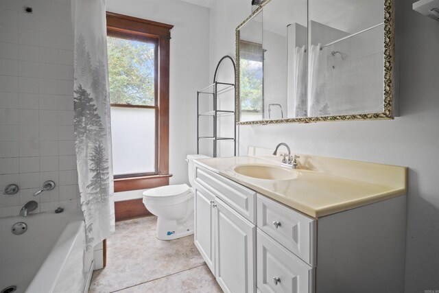 bathroom with tile patterned floors, toilet, shower / tub combo with curtain, and vanity