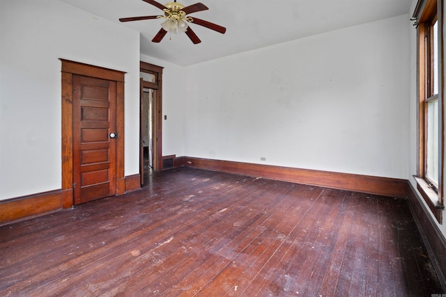 empty room featuring hardwood / wood-style flooring and ceiling fan