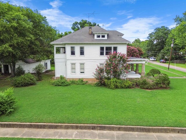 exterior space with a front yard