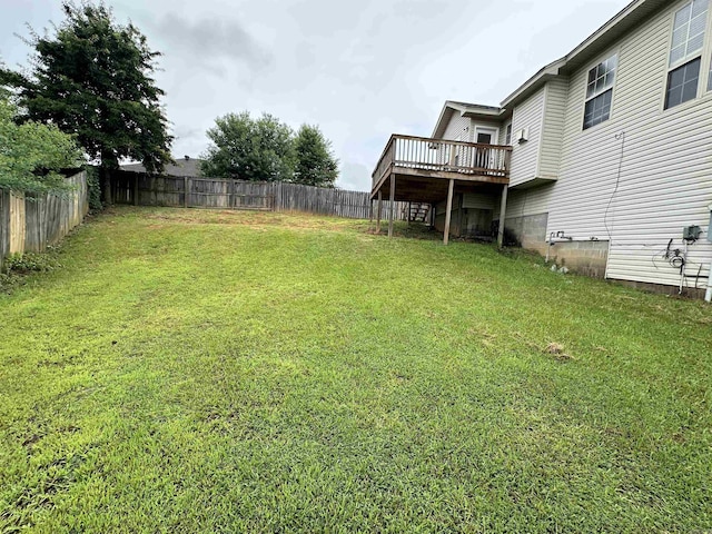 view of yard with a deck