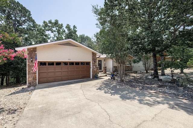 ranch-style home with a garage