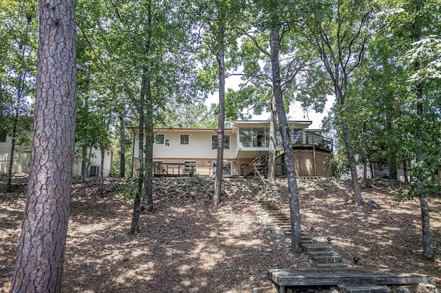 rear view of house with a deck