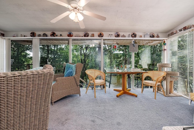 sunroom / solarium with ceiling fan