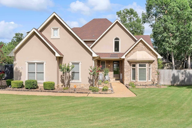 view of front of home with a front lawn