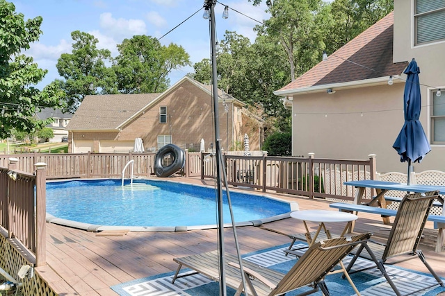 view of pool with a deck