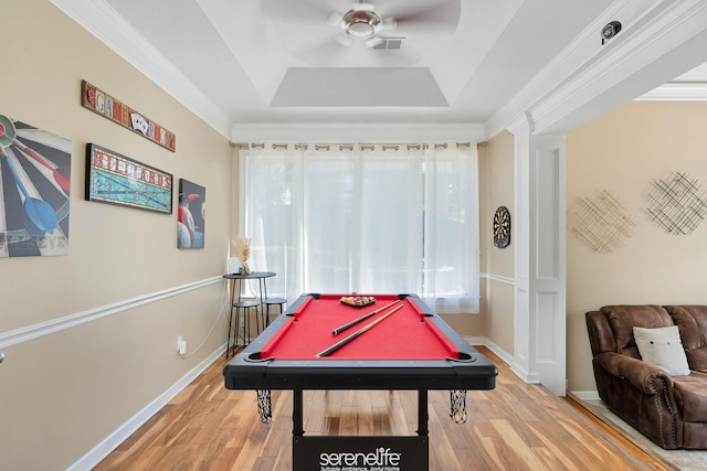 rec room with wood-type flooring, crown molding, ceiling fan, a tray ceiling, and pool table