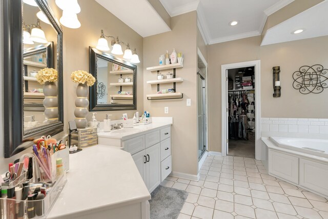 bathroom featuring vanity, crown molding, and separate shower and tub