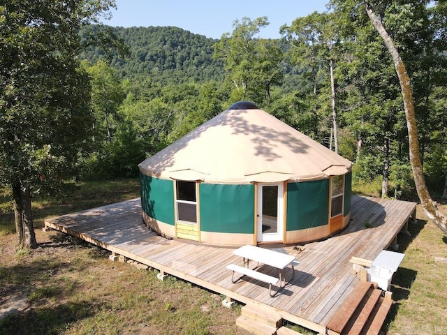 rear view of house with a deck