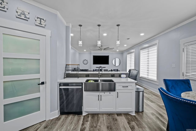 kitchen featuring dishwasher, decorative light fixtures, white cabinetry, sink, and ceiling fan