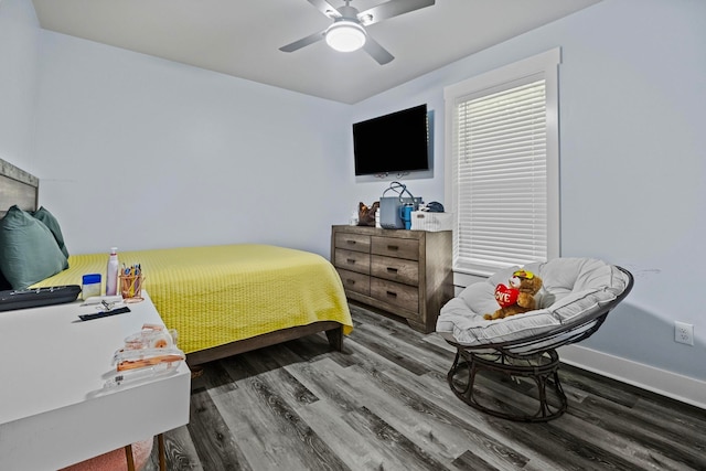 bedroom featuring ceiling fan and hardwood / wood-style floors