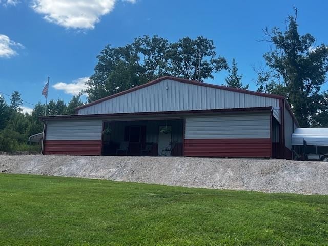 garage featuring a yard