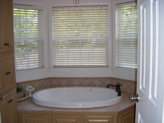 bathroom featuring a tub