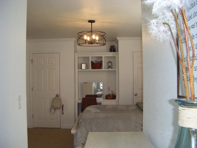 bedroom featuring a chandelier and crown molding