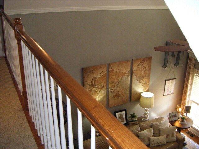 staircase with crown molding