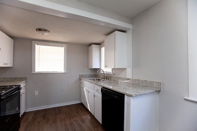 kitchen with black appliances, sink, white cabinetry, dark wood-type flooring, and light stone counters