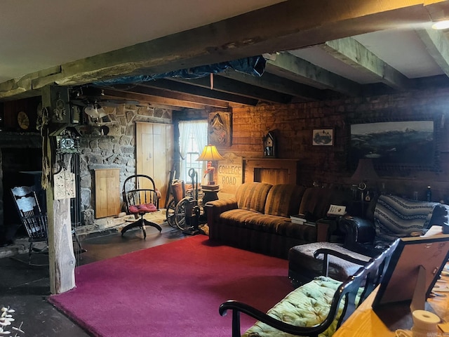 basement featuring carpet and wood walls