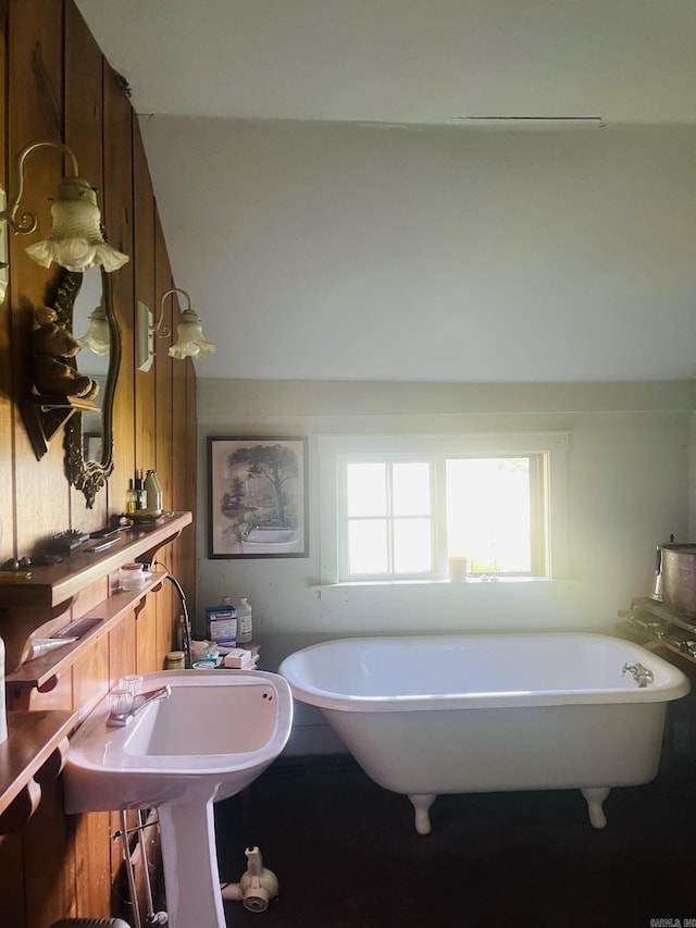 bathroom featuring a tub