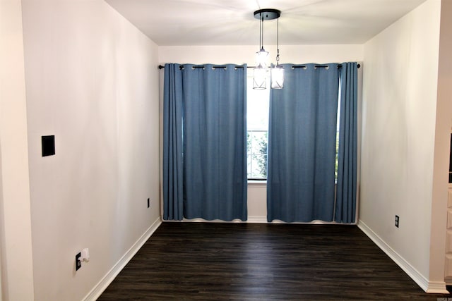 empty room featuring dark hardwood / wood-style floors