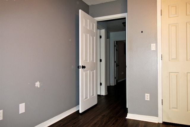 hall featuring dark hardwood / wood-style floors