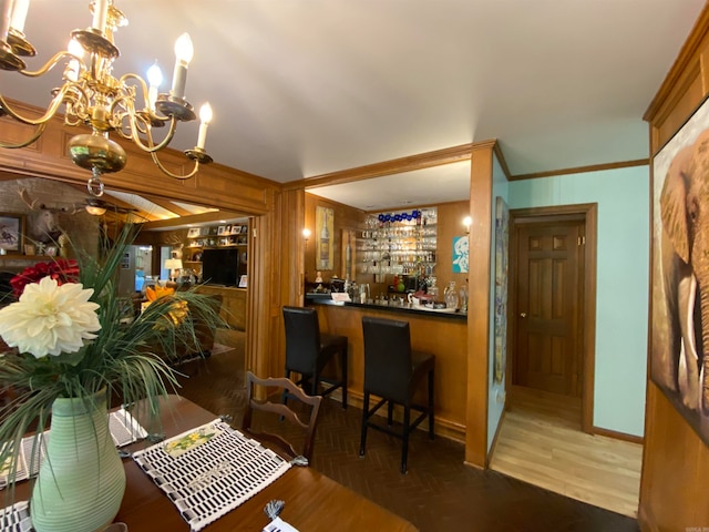 400 Neill Rd, Helena, AR 72342 - dining room featuring an inviting chandelier and ornamental molding